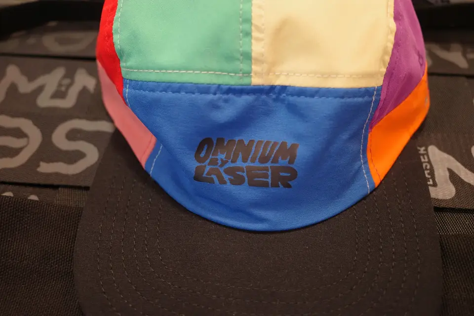 A multicolored cap with a blue brim